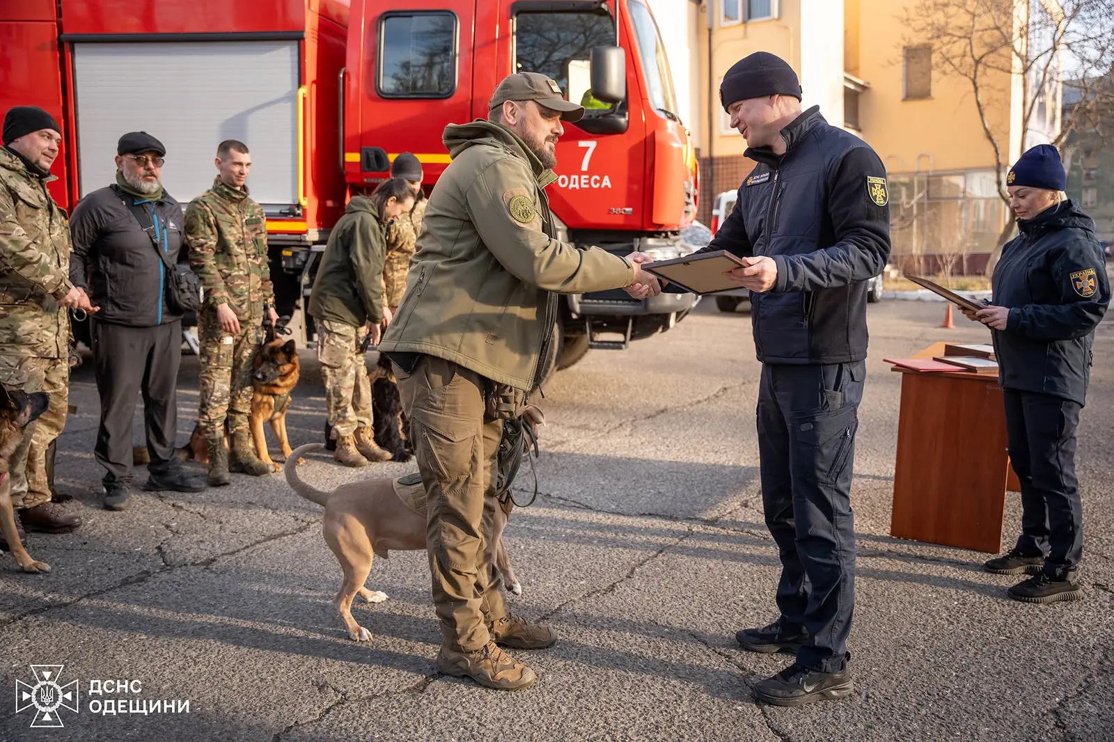 Yevhen Manokhin and Eduard receive a commendation.