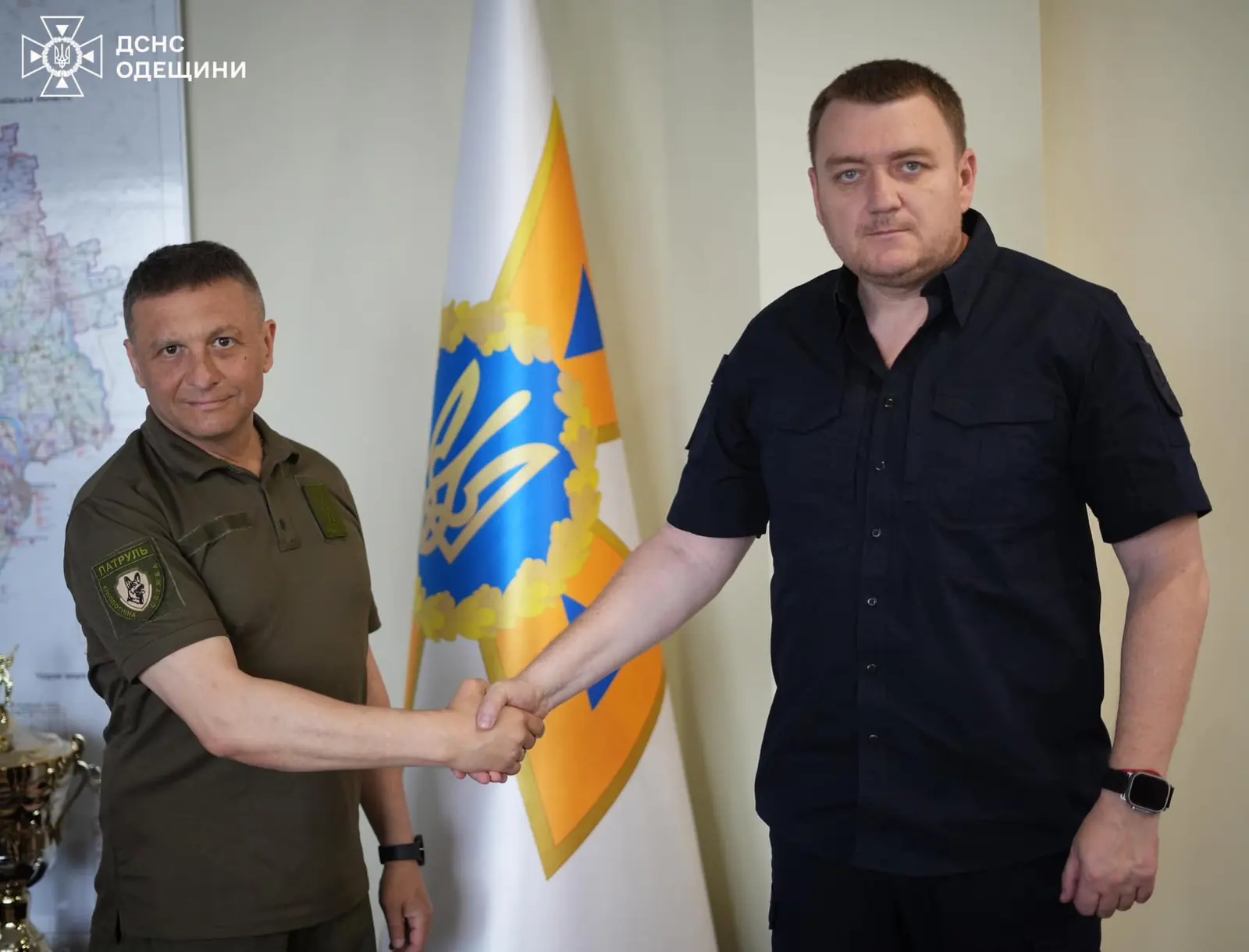 Oleg Radomyslskyi and an SES representative at a cooperation meeting