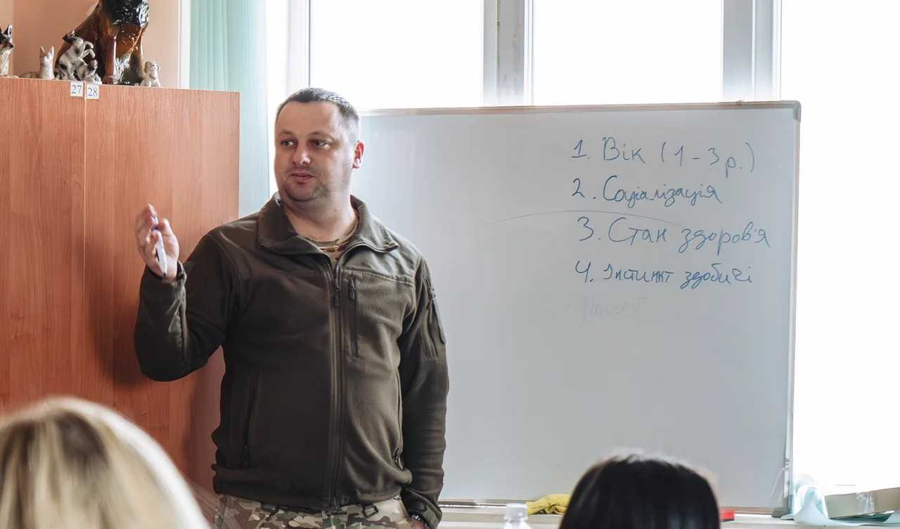 A school teacher explaining material at a whiteboard